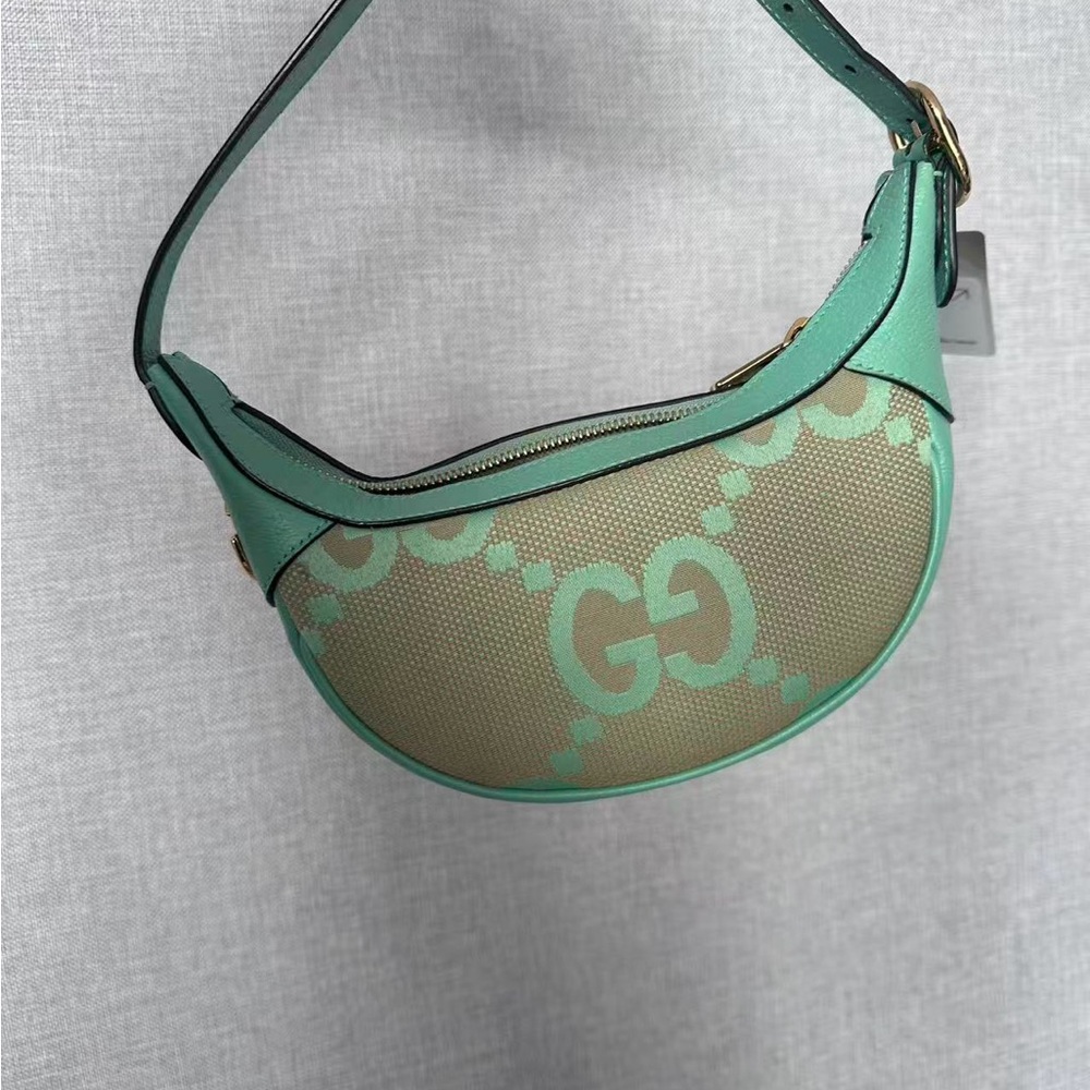 Gucci GG-Pattern Crescent Shoulder Bag in Mint Green